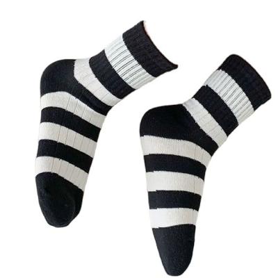 China Breathable Children's socks Korean version of the new autumn and winter boys and girls fashion socks large children's cotton socks black an for sale
