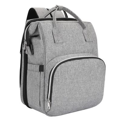 China With USB Omaska Custom Multifunctional Baby Mama Diaper Baglarge Storage Carry On Nappy Diaper Bag Backpack With Portable Changing Pad for sale