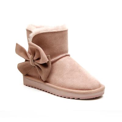 China 2021 New Design Anti-Smell Big Bowknot Sheep Fur Anti-skid Flats Warm Winter Genuine Leather Waterproof Women Snow Boots for sale