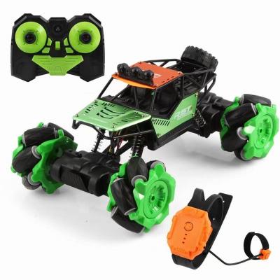 China Popular Automatic Dual Mode RC Stunt Car Rechargeable Remote Control Watch Alloy Drift Climbing High Speed Vehicle For Kids for sale
