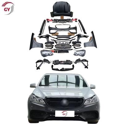 China PP old to new bodykit for Mercedes Benz W212 E class to E63 AMG car bumper fenders hood tail light 212 headlight for sale