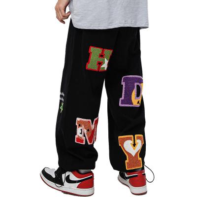 China Wholesale Custom Anti-pilling Screen Printing Black Pants Mens Sport Jogger Pants 3d Embroidered Men Casual Sweatpants for sale