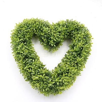 China Home Garden Office Wedding Decoration Wedding Decoration Plastic Hanging Greenery Leaves Heart Shaped Garland Artificial Wreath for sale