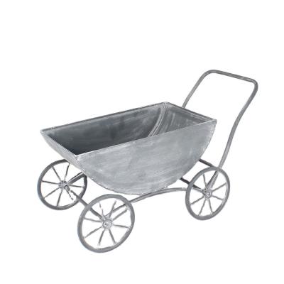 China Eco-friendly Outdoor Wheel Model Decoration Garden Four-wheeled Car Handmade Flower Stand for sale