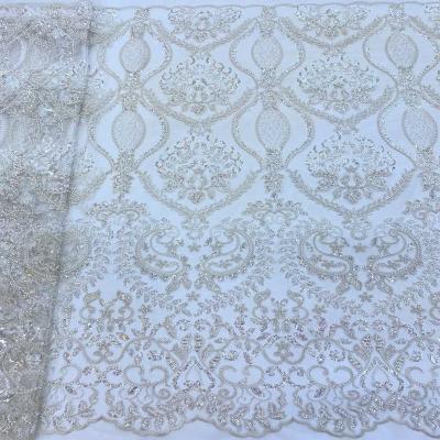 China New Viable Style Beaded Lace With Beads Sequins Fabric Lady Wedding Dresses for sale