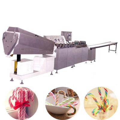 China Colorful CANDY Rainbow Swirl Lollipop Candy Machinery Die-formed Lollipop Production Line Making Machine for sale