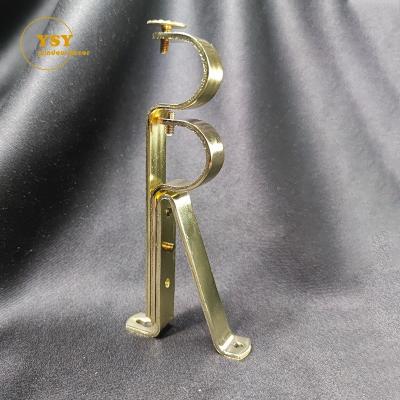 China Contemporary Surface Mount Drapes Thick Wall Bracket Gold Iron Door Adjustable Stretch Curtain Bracket For Curtains Pipe for sale