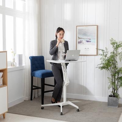 China Desk Gas Lifted Ergonomic Adjustable Height Pneumatic Student Table Leisure Adjustable (Height) Table. for sale