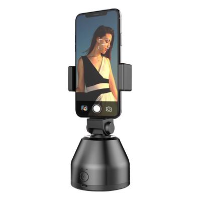 China 360 Rotation Adjustable Portable Smart Selfie Stick Auto Face Tracking Shooting 360 Object Tracking Holder for sale