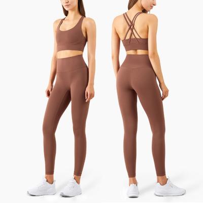 China Breathable Gym Activewear Yoga Suit Beauty Back Sport Wear Fitness Tank Tops Super Soft Gym Fitness Sets Pocket Yoga Pants And Crop Top for sale