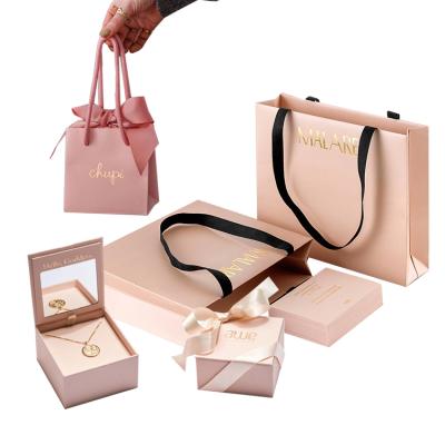 China Recycled Materials Wholesale Custom Large Small Recyclable Kraft Craft Gift Paper Wholesale Paper Bags With Your Own Logo Printed for sale