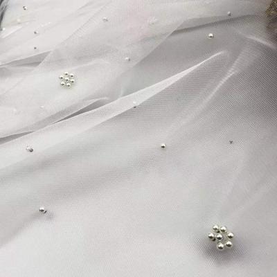 China Breathable NO MOQ 100%nylon border design Tulle bead fabric beaded lace tulle mesh fabric for sale