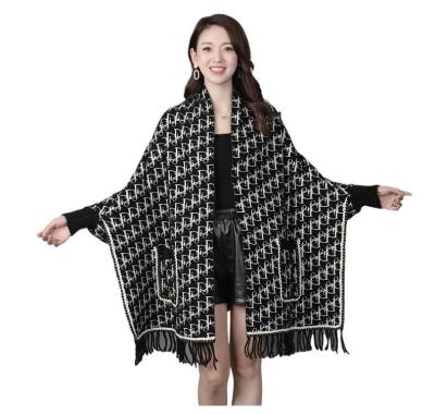 China Warm Knitted Wholesale Shawl Mink Letter Explosion Amazon Anti-pilling Export Coat Shawl for sale