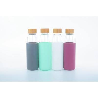 China Sustainable Economic Custom Design Silicone Borosilicate Glass Water Bottle With Wooden Lid for sale