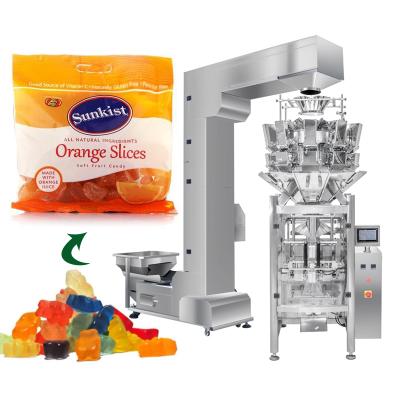 China Full automatic system gummy packaging equipment filling plastic granule pouch pouching weigh jerky nuts packing machine price for sale
