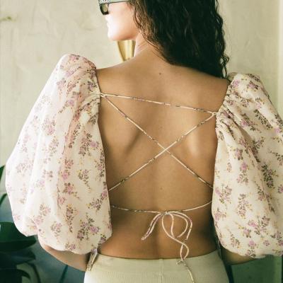 China Anti-pilling Women's Sexy Tops Popular Europe and American Floral Square Backless Bandage Bubble Sleeve Collar Summer Ladies Blouse for sale