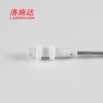 Cina Il commutatore di prossimità capacitivo resistente alla corrosione di CC M12 PTFE 6mm distanzia l'uscita regolabile di PNP in vendita