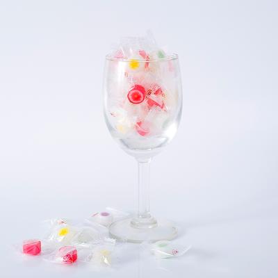 China Best Selling Natural Fruit Candy Peach Sweet Sour Blossom Pattern Hard Sweet Candy for sale
