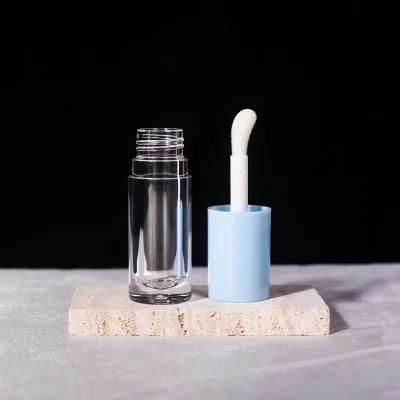 China Gloss Empty Tubes Custom Logo Black Container With Brush 5ML Lip Gloss Tube Gradient Lip for sale