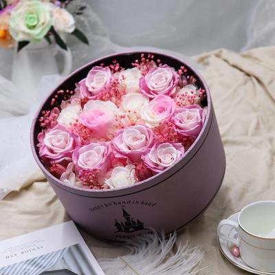 China Long lasting preserved flowers in surprise magic flower box for lover rose big preserved rose in poke ball for sale