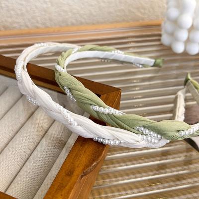 China New Summer Hair Decoration Twist Hair Band Pearl Beaded Headbands Accessories Female Simple Non-slip French Braided Hair Band for sale