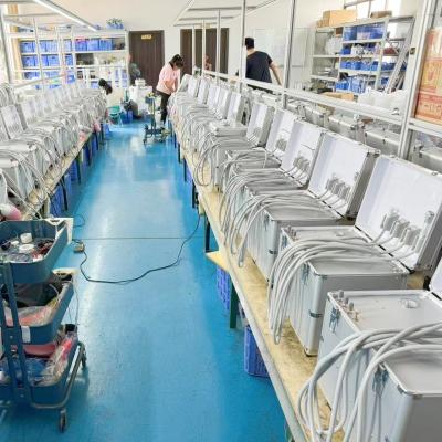 China Draagbare behandelingskist tandheelkundige kliniek Turbine-eenheid met luchtcompressor zuigsysteem en triplex spuit voor tandheelkundige praktijk Te koop