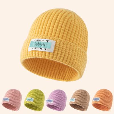 China XUFANG New Arrival Fashion Winter Hats JOINT Solid Color Baby Hats Manufacturers Kids Warm Winter Woolen Hats for sale