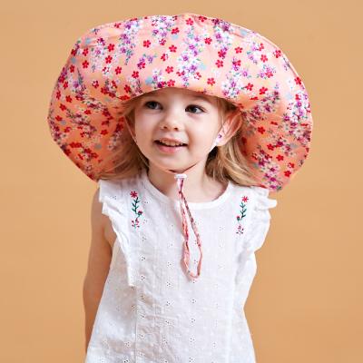 China XUFANG Casual Fashion In Children Running Sun Visor Beach Small Ins Kids Floral Plus Rope Kids Bucket Windproof Hats for sale