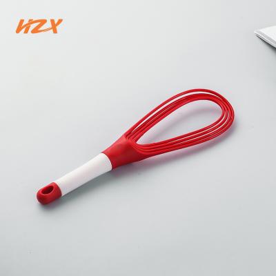 China New Arrival Viable New Arrival Kitchen Tools Instruments Folding Silicone Egg-beater Silicone Hand Egg Beater for Cooking Mixing for sale