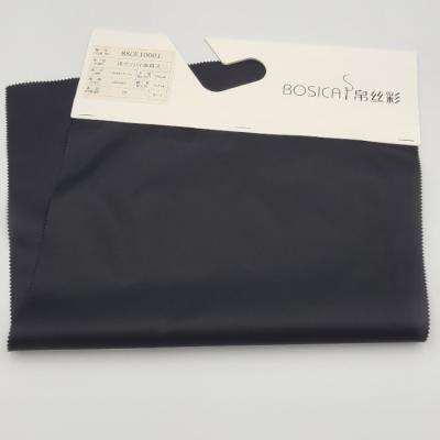 中国 210Tは58のGsmプラスチック ポリエステル生地のタフタのライニングをリサイクルした 販売のため