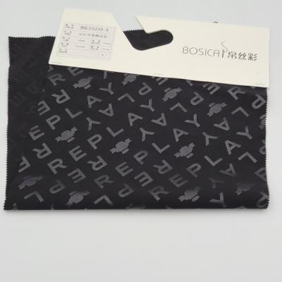 China 75D Embossed Graphic Print Fabric 58in Polyester Memory Printing for sale