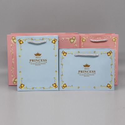 China Multiple Color Custom Printed Reusable Shopping Paper Bag With Twisted Handle for sale