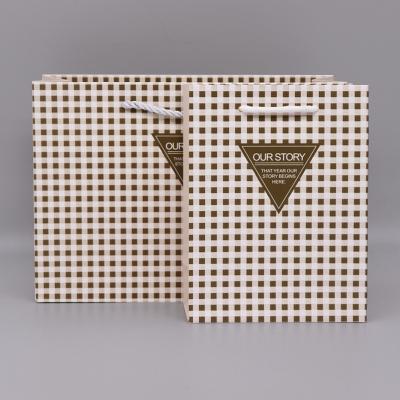 China Simple Style custom Paper Bag Packaging For Clothes OEM ODM acceptable for sale