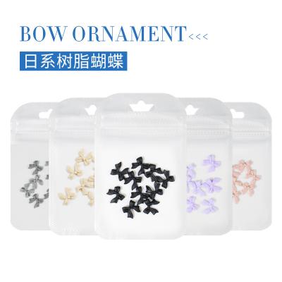 China The shinny nail cosmetics nail decoration 3D resin nail art faux stone color butterfly nail art accessories for sale
