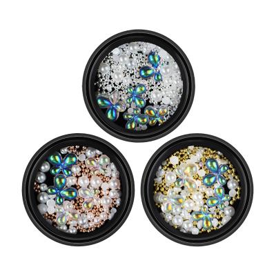 China Nail Beauty Products Mixed Sizes Flat Back Rhinestone Nail Art Crystal Butterfly Pearl 3d Shinny Nail Art Decoration for sale