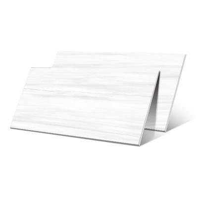 China Non Slip Porcelain Tile Materials Carrara White OEM ODM 60x120 Tiles Soft Polished Full Body Marble Stone Porcelain Tiles Bathroom Tiles For Flooring for sale