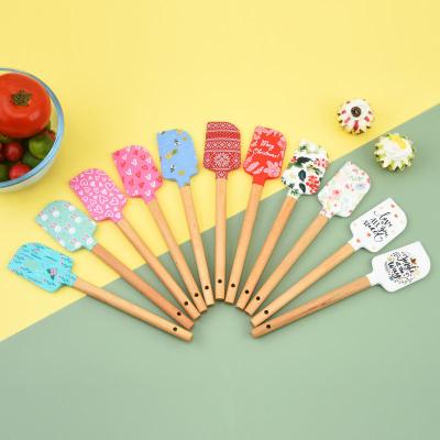 China Sustainable Colorful Nonstick Kitchen Tools Silicone Scraper Baking Cookware for sale