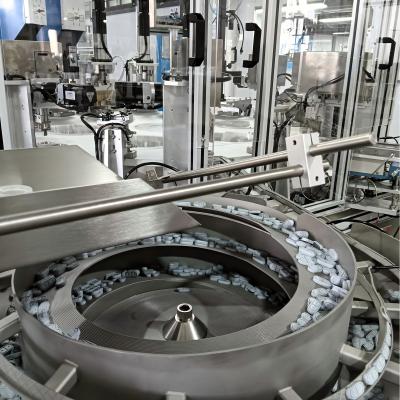 China Máquina de montagem automática de tampas de laminação não-padrão com superfície plana e boa vedação à venda