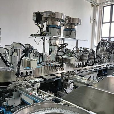 China Niet-standaard geautomatiseerde pompkop assemblage machine, lustype met een hoge capaciteit, hoge configuratie en goede kwaliteit van de apparatuur Te koop