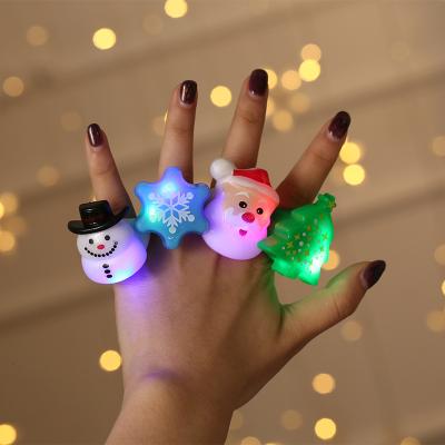 China Glowing Ring Santa Claus Ring Christmas Gifts Snowflake Snowman Toys Sale Gift Good Price Party Warm Light Finger Ring for sale