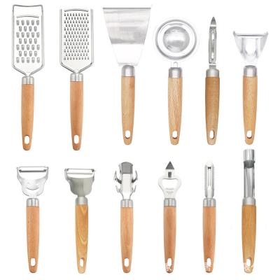 China Viable Wooden Handle Garlic Press Cheese Grater Can Vegetable Opener Potato Peeler Bottle Opener Pizza Cutter Egg Divider Separator Tools for sale