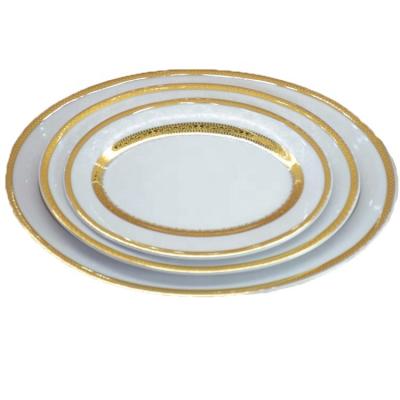 China Sustainable Luxury Elegant Gold Rim Porcelain Hotel Restaurant Dinner Dishes Tableware Set for sale