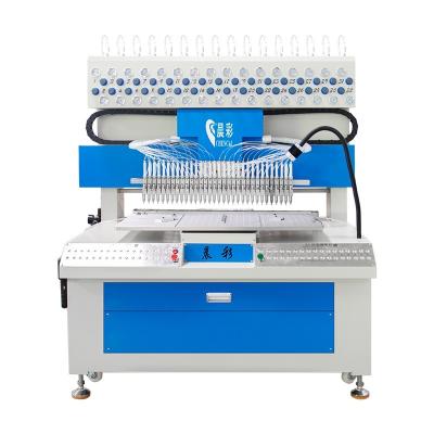 China 32 Colors Automatic Silicone Dispensing Machine Liquid PVC Rubber Patch Dripping Machine for sale