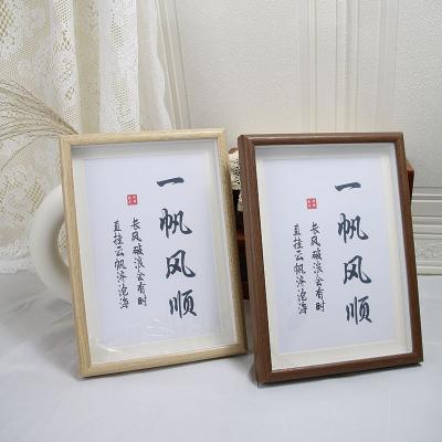 China Modern Simplicity Calligraphy Photo Frame A4 Wood Inspired Photo Frame Customized Wall Hanging Mounted Picture Frame In Stock for sale