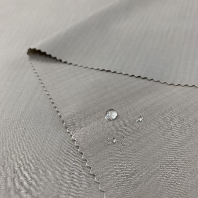 China Water Resistant LOWEST PRICE TAIWAN LOT COTTON RIBSTOP FABRIC RUNNING CANVAS RIBSTOP FOR PANTS CLOTHES for sale