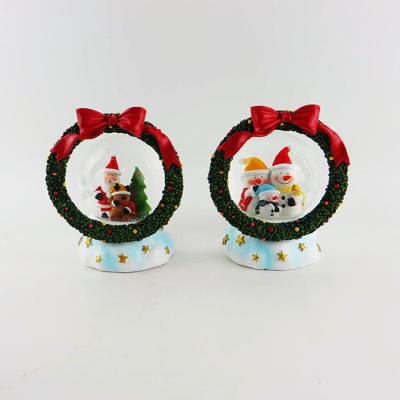 China Europe Polyresin Snow Globe Santa Claus Snow Globe For Christmas Decoration for sale