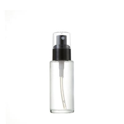 China Cosmetic Empty Clear Airless Liquid Foundation Spray Packaging Glass Bottle With Black Pump for sale