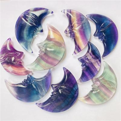 China DONGHAI Wholesale Natural Hand Carved Crystal Rainbow Fluorite Quartz Moon With Face For Healing for sale