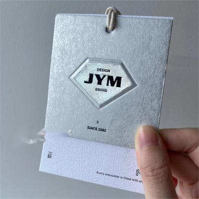 China Cold Stamping Custom Gift Tags Paper Anti Counterfeit Labels Kraft Paper Hang Tags Printable for sale