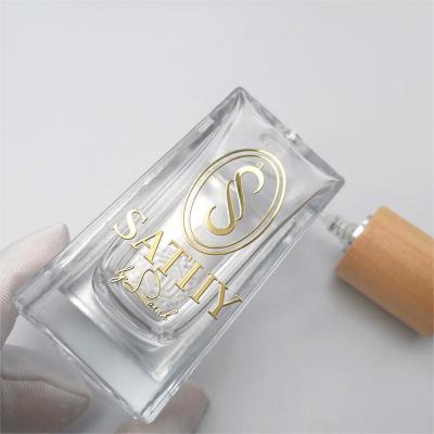 China Custom 3D Cosmetic Adhesive Gold Foil Sticker Perfume Glass Bottle Logo Label for sale